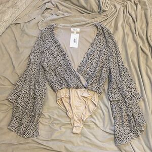 Peach Love California Black and Cream Ruffle Sleeve Bodysuit